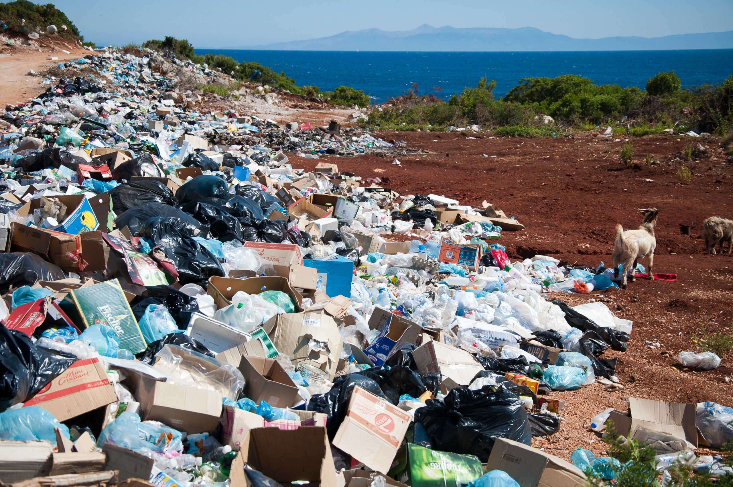 Garbage pile on a beach near the ocean