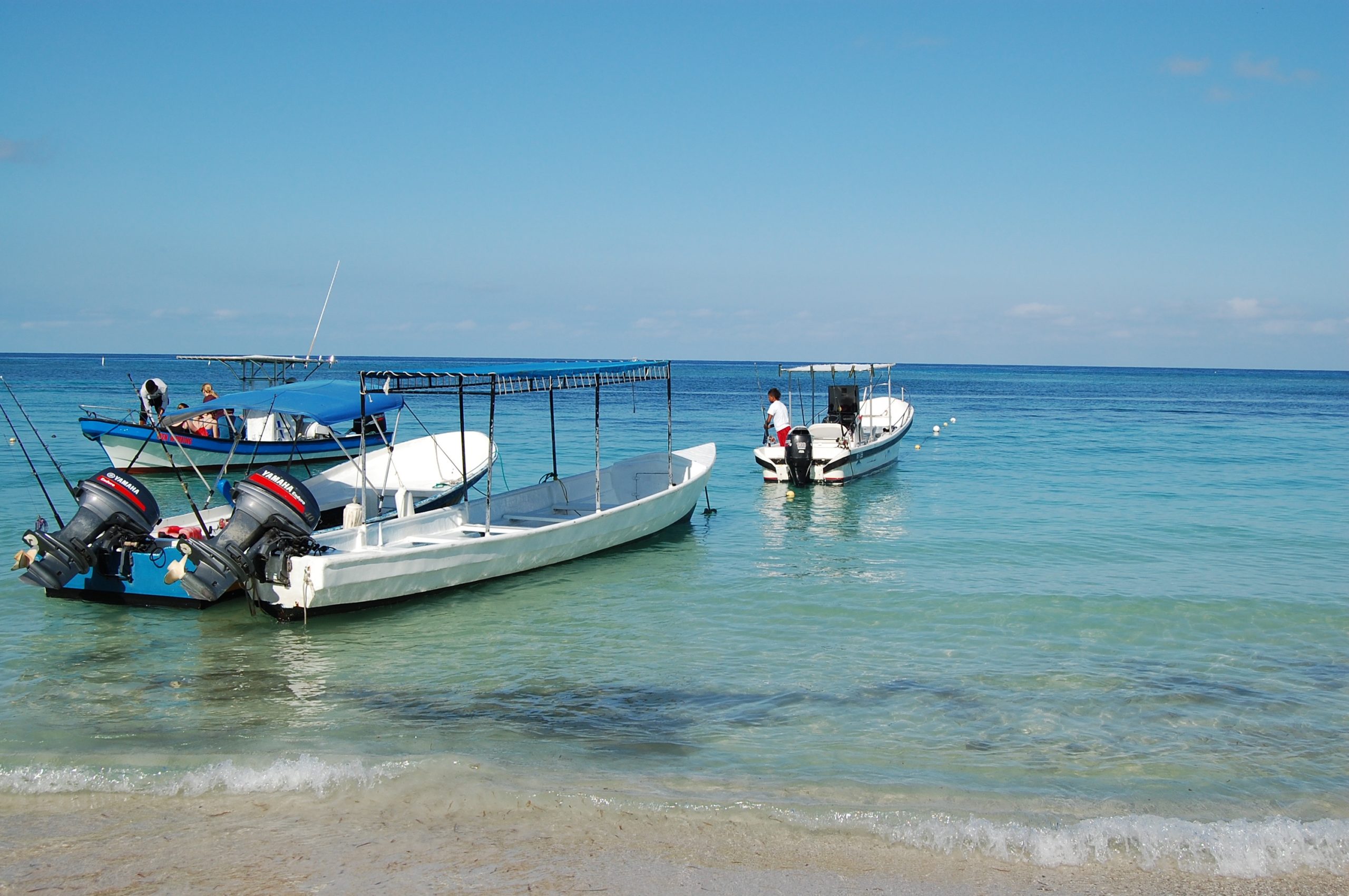 boats parked off the coast of Roatan, Honduras